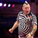 Peter Wright progressed at the Winter Gardens last night Picture: Taylor Lanning/PDC