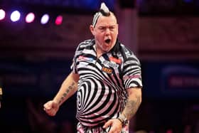 Peter Wright progressed at the Winter Gardens last night Picture: Taylor Lanning/PDC