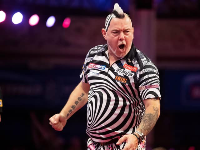 Peter Wright progressed at the Winter Gardens last night Picture: Taylor Lanning/PDC