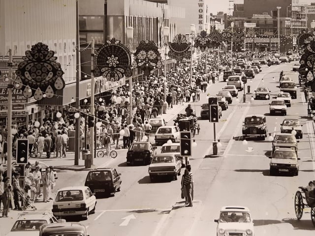 A view looking south in May 1986 - probably one of the bank holidays. Landaus, thousands of people, the Illuminations, attractions - Blackpool's peak season summed up in one picture