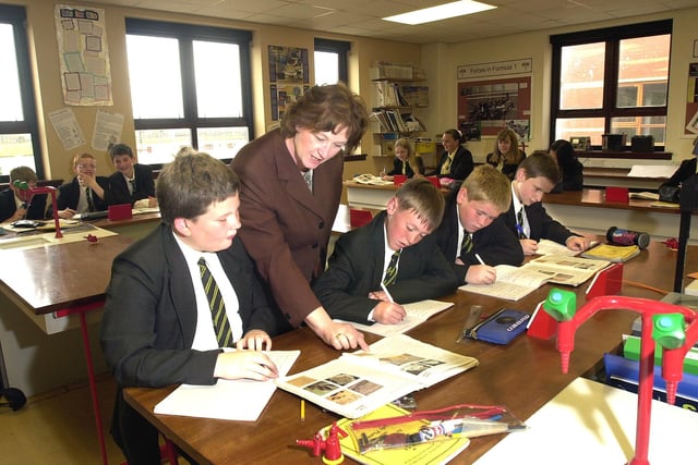 Lytham St Annes High, Mrs Win Sweeney takes a science class, L-R, Nathan McGarry, 13, James Hartley, 13, Rory Melia, 13, and Elliott Levi, 13