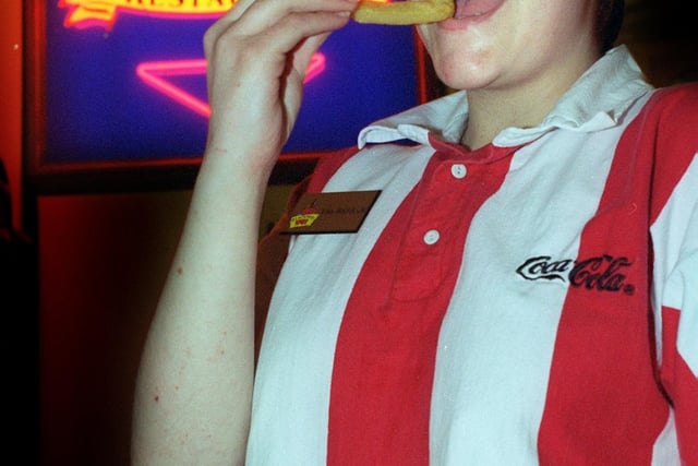 Blackpool Tower catering assistant Lisa Haddock tucks into a plate of Fish and chips at the new Horace Harbuckles Fish and chips restaraunt at Blackpool Tower, 1997