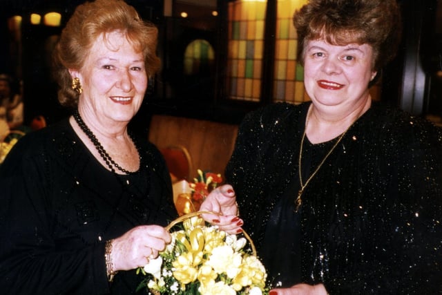 Mrs Doreen Woods presenting flowers to Marilyn Wilson, Chairman of the Blackpool & Fylde Light Operatic Company at the Annual Dinner and Dance on 28th Feb 1998