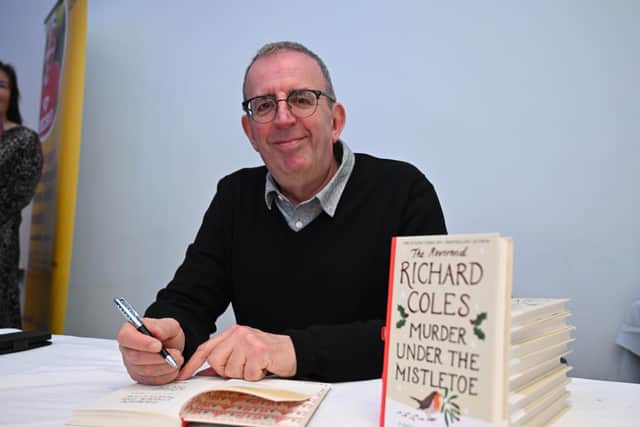 Revd Richard Coles signs copies of his book