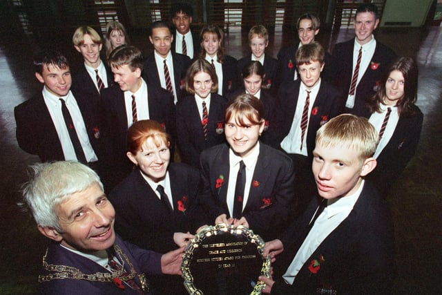 President of the Cleveleys Association of Commerce and trade John Prothero handed a silver plate to pupils to mark the forging of links between the school and the local business community in 1997. Pictured front left to right: John Prothero, Head Girl Kirsty Kettlewell, Deputy Head Girl Katie Boocock and Head Boy Stuart Daintith.