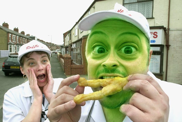 Battered frogs legs were being served at Raffles Fish and Chip shop in Cunliffe Road, 2002. Lynn Tyrer watching David Humphreys, as he eats  just 'one frog's leg too many !'