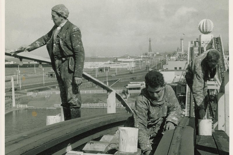 Painting the wooden rails in 1963. Track length for the rollercoaster is 3,295ft
