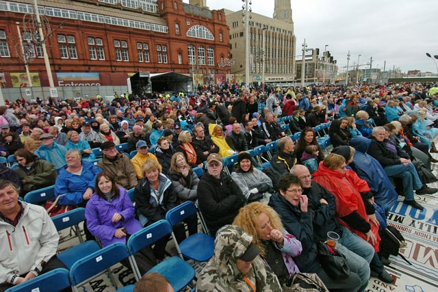 Fans braved unseasonable conditions to watch the concert - can you spot yourself?