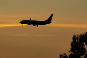 A plane coming in to land. Credit: Peter Byrne/PA Wire