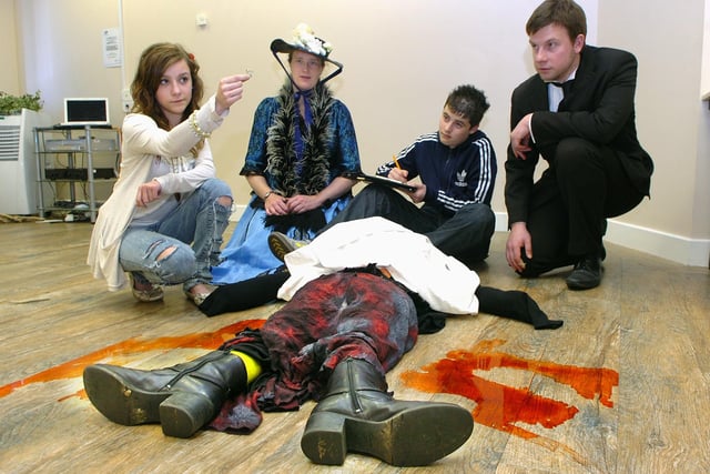 'Jack the Ripper' day for Collegiate High School year ten pupils at the City Learning Centre, Grange Park, Blackpool. Pupils Rebecca Singleton (15) and Henry Bell (14) examine the evidence on his latest victim. Also pictured in costume are Helen Chiula and Phil Wright (City Learning Centre).