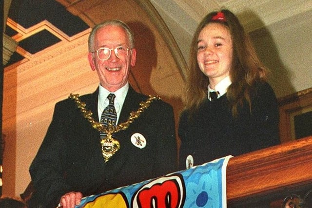 14-year-old Lisa Martin of Palatine High School unveiled a Millennium banner helped by the Mayor of Blackpool-Councillor Bill Burgess, at Blackpool Town Hall
