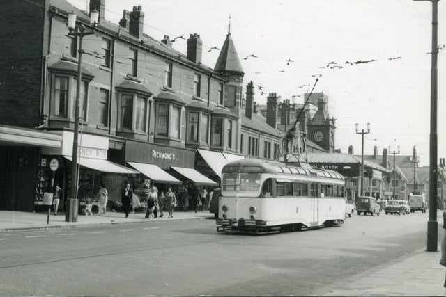 Dickson Road looking towards Talbot Road. The Talbot Hotel on the far right, Blackpool North railway station can be seen behind the tram. The canopy of the Odeon Cinema can be seen on the far left. The tram is seen at the Dickson Road terminus, this line opened in 1898, joined the promenade line at the Gynn in 1920,  but closed on October 27, 1963