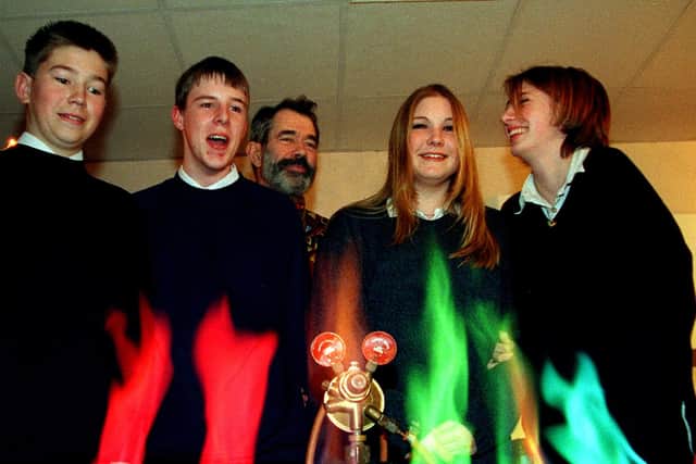 University of Central Lancashire lecturer, Dr Chris Mortimer, at Blackpool Sixth Form with students David Greenall, Andrew Haagensen, Lindsay Trott  and Amy Harriso in 1997. His lecture was 'Reactions a Go Go'