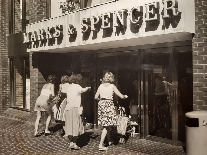 Marks and Spencer in July 1989. The caption on the back says 'Right of way - mums and children storm the portals'.
