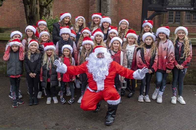 These youngsters were joined by Father Christmas during the build-up to the big switch-on in Lytham. Picture: Roger Moore Photography.