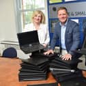 MHA Moore and Smalley has donated laptops to help those in need with computer refurb firm Nybble. Pictured Karen Morris, Graham Gordon, Ram Gupta
