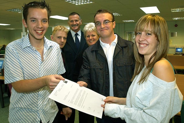 Adam Walthaus, Adam McCance and Louise Rigby. Behind are (from left), Councillor Simon Blackburn, Brian Watt (College assistant principal) and Sue Pugh (Regional Organiser-Labour North West). They had written a letter to Tony Blair in 2003