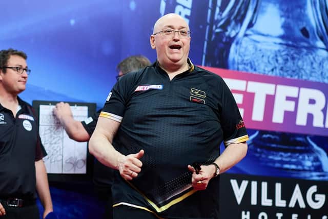 Andrew Gilding plays Michael van Gerwen in Blackpool Picture: Mark Robinson/PDC