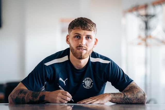 Grimshaw signs his new deal
