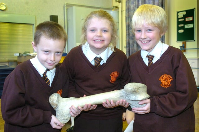 Blackpool Zoo's Zoo2U visits children at Roseacre Primary School in Blackpool. Pictured left to right holding a piece of bone are Mark Carrier, nine, Emma Wakefield, nine, and Connor Dunleavy, nine