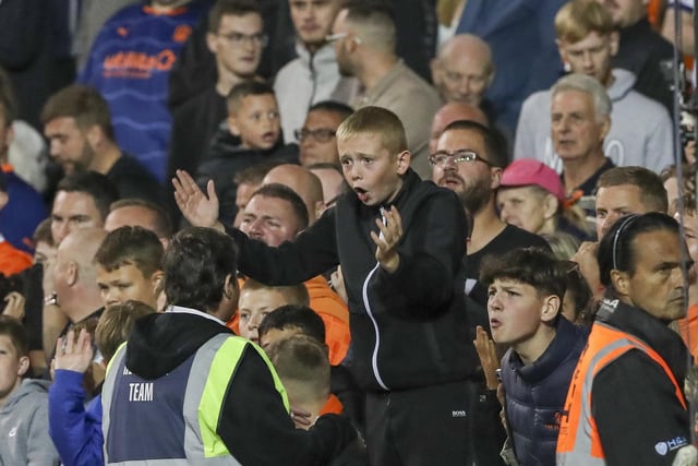A Blackpool fan shouts at the referee