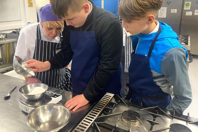 Pupils measuring their recipes to perfection