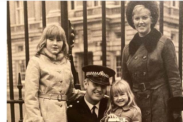 Kenneth Mackay with his family outside Buckingham Palace in 1972, after receiving the George Medal.