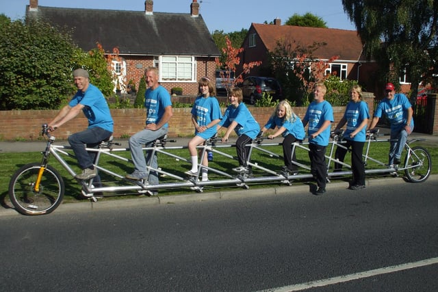 Dave Lawrenson and Maggie Dainty take their eight-man bike on a tour of Garstang to raise funds for their Mount Kilimanjaro climb in 2009. Pictured (from left): Russelll of Lancashire Limos, Dave Lawrenson, Lucy Astbury, James Astbury, Madeleine Lawrenson, Luke Godden, Maggie Dainty, Peter Richardson