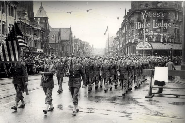 American servicemen stationed at Warton parading through Talbot Square, 1940s