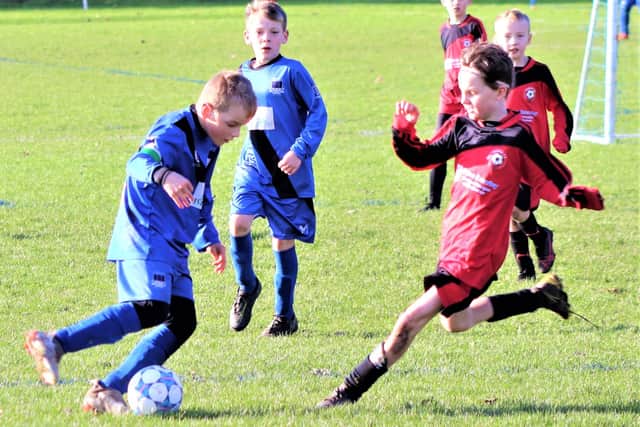 Action from our under-9s match of the week between FC Rangers and Poulton FC Spartans