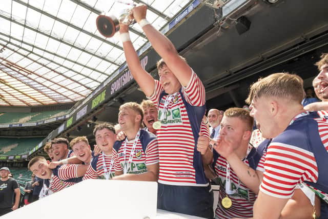 Lancashire lift the trophy after winning the Jason Leonard U20 County Final at Twickenham Photo: Adam Scott