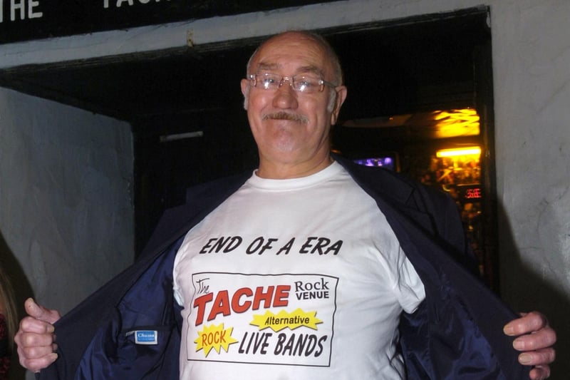 Ron Blunden shows his end of an era t-shirt at the last night of The Tache