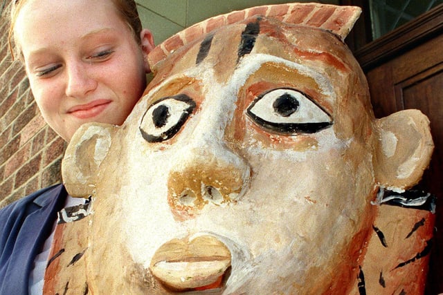 Size of Africa day - 13 year old Emma Jeffries with an African mask in 1999