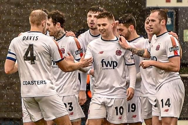 Nick Haughton celebrates the first of his two goals for AFC Fylde against Barnet Picture: Steve McLellan