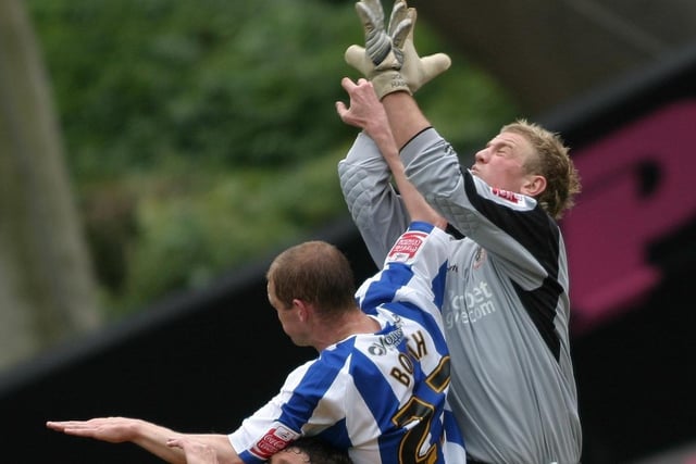 Joe Hart foils Huddersfield's Andy Booth