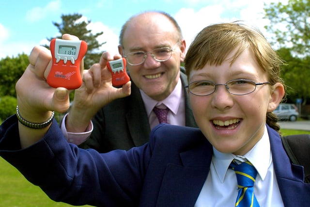 Sally Wynne and assistant headteacher Bill Allison with their pedometers, at Hodgson in 2004