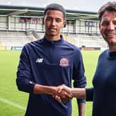 AFC Fylde new boy Kyron Gordon with Chris Beech, the club's director of football Picture: AFC Fylde