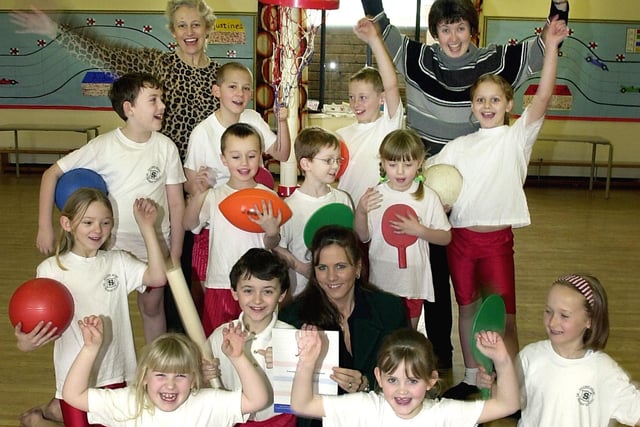 Pupils and teachers at Sacred Heart RC Primary School were celebrating after being awarded nearly £5,000 from the National Lottery for new sport equipment in 2002.
Pictured are PE Co-ordinator Celia Gibson (back left), Sarah Burgess who organised the bid, Deputy Head Amanda Clayton and pupils.