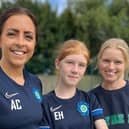 Abby Chamberlain (left) with player Eleanor Hardy, 12, and her mother Pip Hardy (Credit: David Hardy/PA)