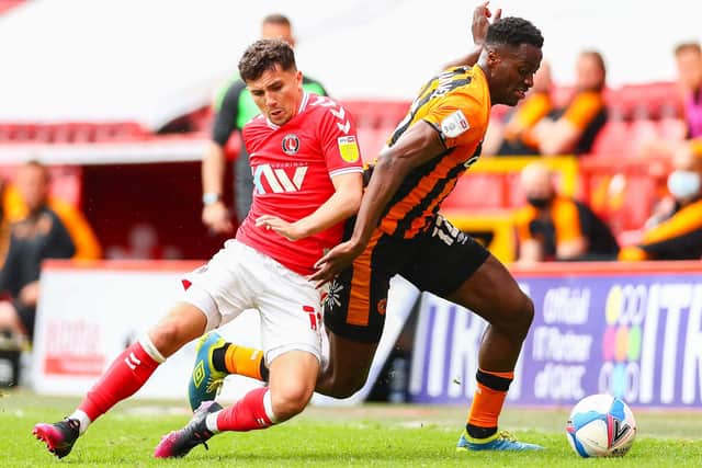 LONDON, ENGLAND - MAY 09: Albie Morgan of Charlton Athletic battles for possession with Josh Emmanuel of Hull City  during the Sky Bet League One match between Charlton Athletic and Hull City at The Valley on May 09, 2021 in London, England. (Photo by Jacques Feeney/Getty Images)