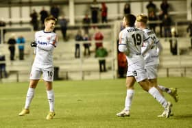 AFC Fylde celebrate as Nick Haughton (left) opens the scoring against Hartlepool  Photo: STEVE MCLELLAN