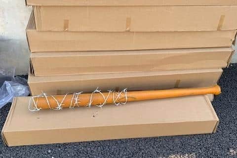 Police also found baseball bats wrapped in barbed wire - priced at £45 - for sale at Foxhall Market in Blackpool