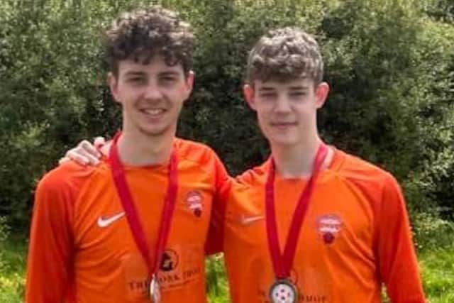 Poulton Town Under-18s long-service award winners Regan Malone (left) and Thomas Powl