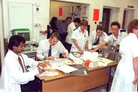 Doing what they do best back in 1997 - but nothing changes. It was all hands on deck in A&E as the number of patients admitted exceeded the number of beds available. To make matters worse there was also a staff shortage due to the flu virus