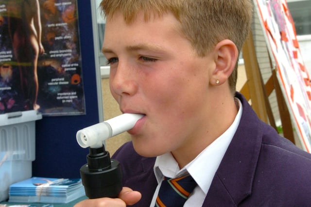 Palatine High School's smoking awareness week. Pupil Jake Darnell (14) on the mini smokerlyzer