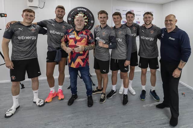 Blackpool's players met Peter Wright and PDC referee Russ Bray at Squires Gate Picture: Taylor Lanning/PDC