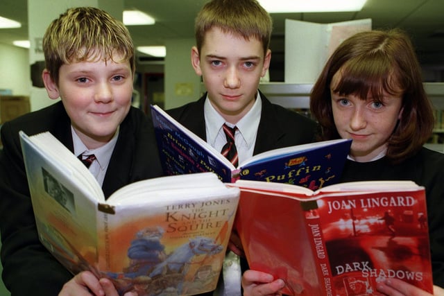 Danny Bonell, Josh Wilson and Jenna Bullock who were reviewing books for the book of the year award