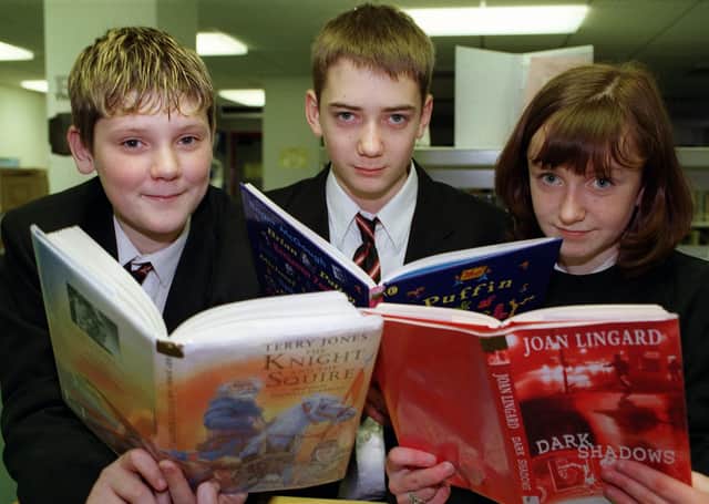 Danny Bonell, Josh Wilson and Jenna Bullock who were reviewing books for the book of the year award