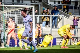 Sam Osborne celebrates AFC Fylde's late winner against Hereford Picture: STEVE MCLELLAN