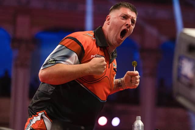 Blackpool's Winter Gardens saw Daryl Gurney defeat Rob Cross in a thrilling Betfred World Matchplay first round meeting